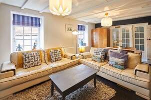 2 habitaciones y tabla de planchar con plancha 