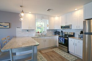 Fridge, microwave, stovetop, cookware/dishes/utensils