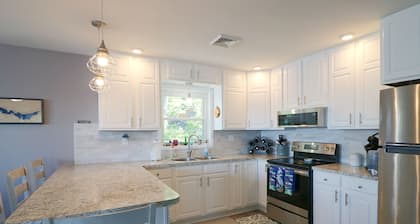 Soak in the expansive views and enjoy lakefront at Willow Avenue! **Hot Tub**