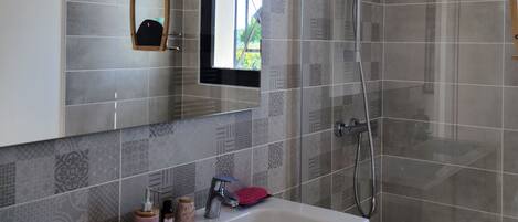 Shower, hair dryer, towels, soap