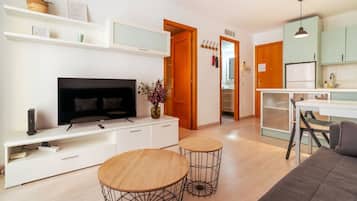 Apartamento | 1 dormitorio y tabla de planchar con plancha