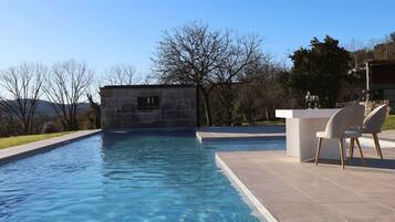 Indoor pool, outdoor pool, open 10:00 AM to 9:00 PM, pool umbrellas