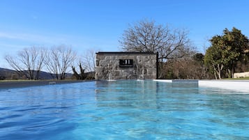 Indoor pool, outdoor pool, open 10:00 AM to 9:00 PM, pool umbrellas