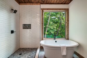 Shower, hair dryer, towels, shampoo