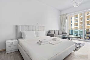 Desk, iron/ironing board, free WiFi - WelHome - Greenery Apt for Modern Studio in Production City (Dubai)