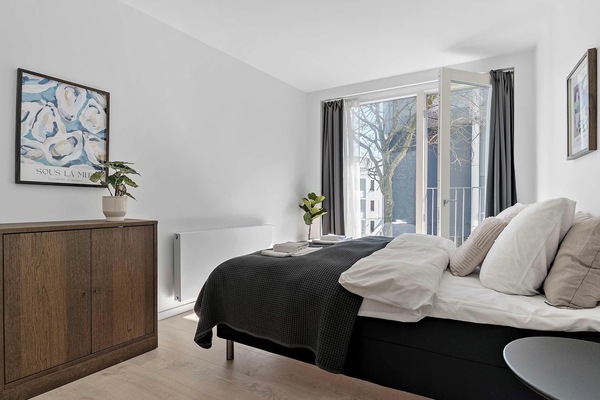 First bathroom with french balcony and lots of natural light. Also with a closet for your personal belongings, along with bedside table and double-curtains (Thin curtains and blackout curtains).