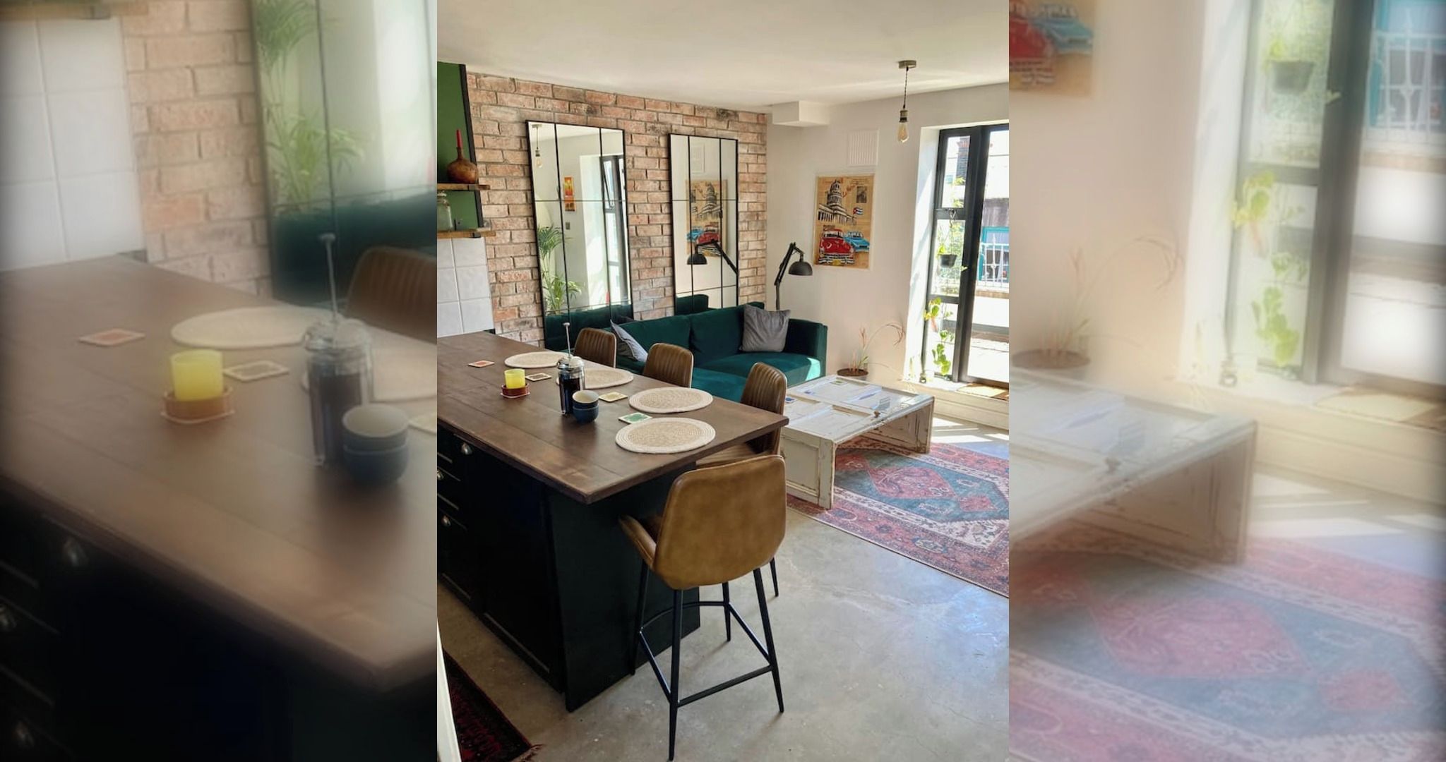 Un espace de vie moderne comprenant un coin repas, un canapé vert et une table basse.