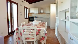 Apartment, Sea View | Living area - Stazzu Fioritu trilocali vista mare (San Teodoro)