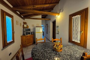 Family Townhome, Multiple Bedrooms, Mountainside (Villetta Alessia) | Dining - Villetta Alessia (San Siro)