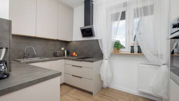 Departamento, 1 habitación, balcón | Cocina privada | Microondas, lavavajillas, cafetera y tetera y tostadora
