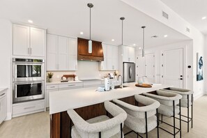 Fridge, microwave, oven, stovetop - New Luxury Home with Beach Views and Pool, 1 min to Beach - Siena Sky (Anna Maria)