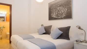 2 habitaciones, tabla de planchar con plancha, internet y ropa de cama