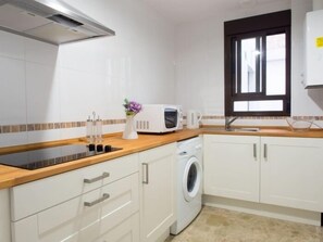 Fridge, microwave, coffee/tea maker, toaster