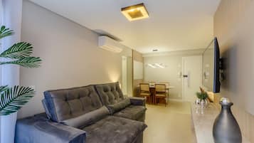 Basic Apartment | Living area | 40-inch TV with digital channels