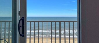 Your Modern Beach Condo Awaits! Sun & Dolphins