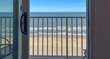 Your Modern Beach Condo Awaits! Sun & Dolphins