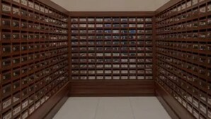 A storage room with shelves filled with labeled boxes. - Triple view Condotel Superior manila bay Downtown /st lukes /steps robinson mall (Manila)