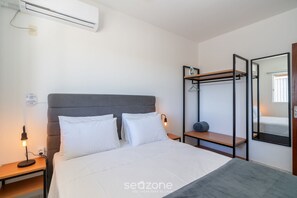 Apartament bàsic | 1 dormitori, planxa i posts de planxar, wifi gratuïta i roba de llit