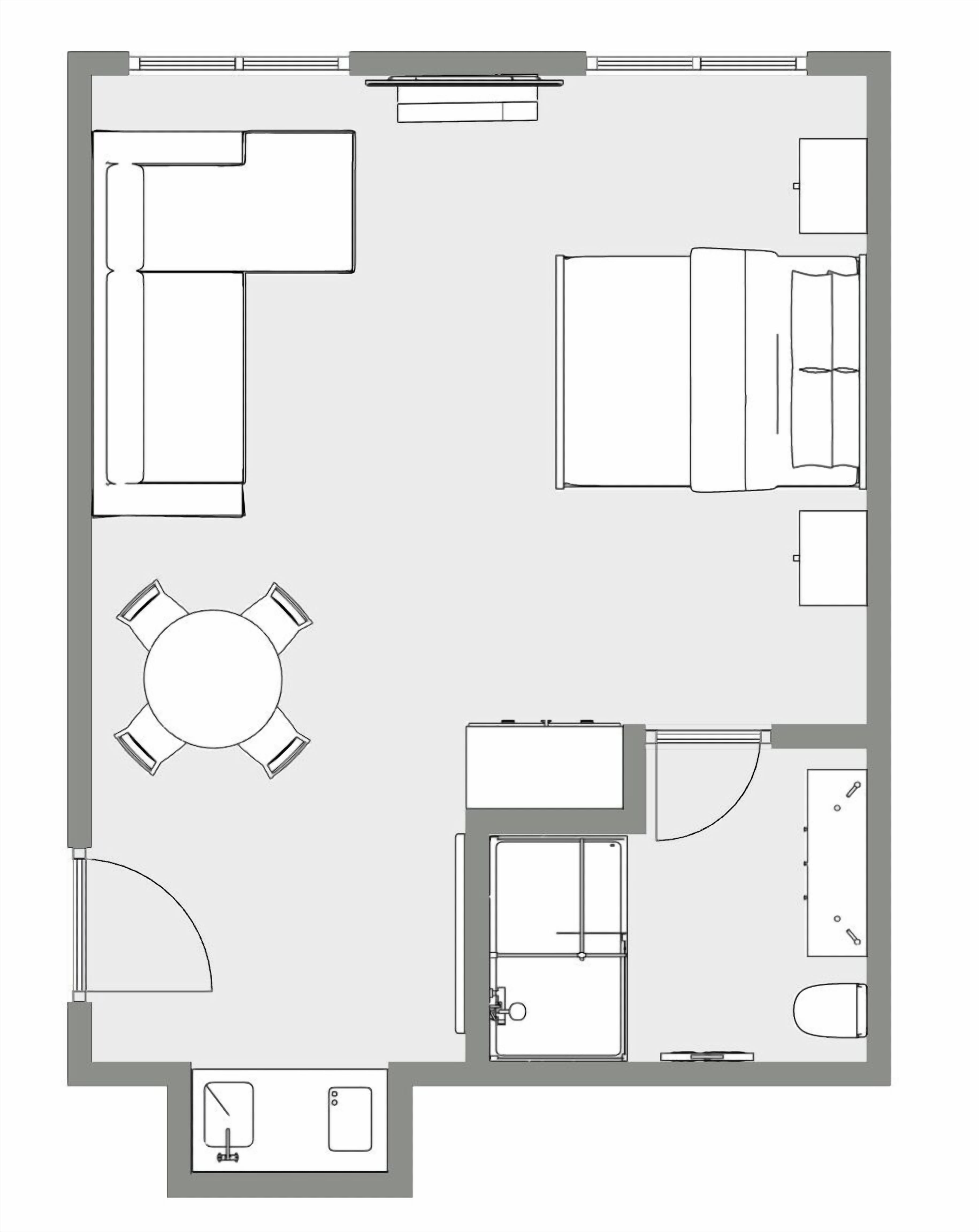 Een plattegrond van een hotelkamer met een bed, een bureau, een stoel, een kleine badkamer en een eethoek.