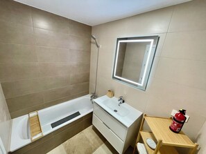 Shower, bidet, towels, soap