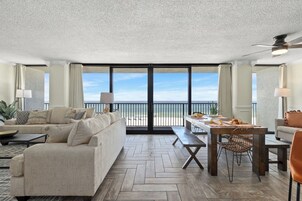 "Island Bound" - 2 Bedroom 2 Bath Beachfront Condo | Living area | 32-inch LED TV with cable channels