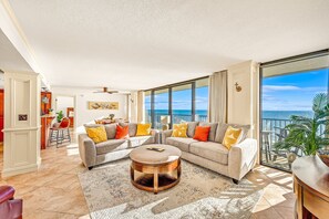 "Just Beachy" - 2 Bedroom 2 Bath Beachfront Condo | Living area | 32-inch LED TV with cable channels - Sandpiper Beacon Beach Resort (Panama City Beach)