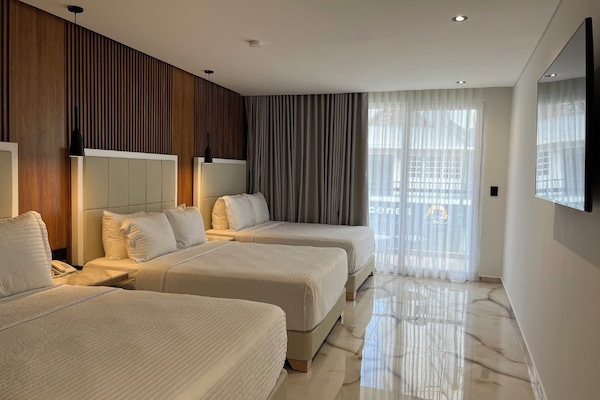 Ropa de cama de alta calidad, sistema de insonorización y wifi gratis