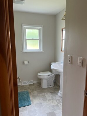 Double Room | Bathroom | Shower, towels, soap, shampoo