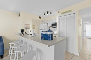 Coffee/tea maker, fridge, microwave, oven