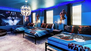 A Star Wars-themed bedroom with two beds, posters, and LED lighting. - Spacious villa with 10 bedrooms 4508 (Kissimmee)