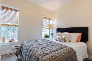 Premium bedding, down duvets, memory-foam beds, laptop workspace - Aisling Suites (Great Falls)