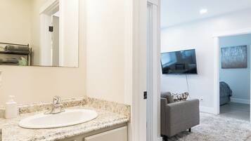 Traditional Apartment | Bathroom | Combined shower/bathtub, hair dryer, towels, soap