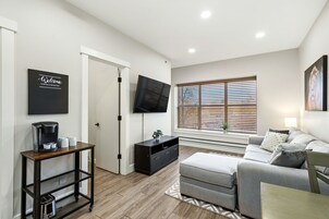 Family Apartment | Living area | 55-inch Smart TV with digital channels, Netflix, Hulu