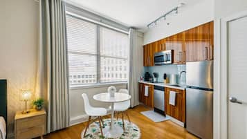 Signature Studio, 1 Queen Bed with Sofa bed, Pool Access | Private kitchen | Fridge, microwave, oven, stovetop