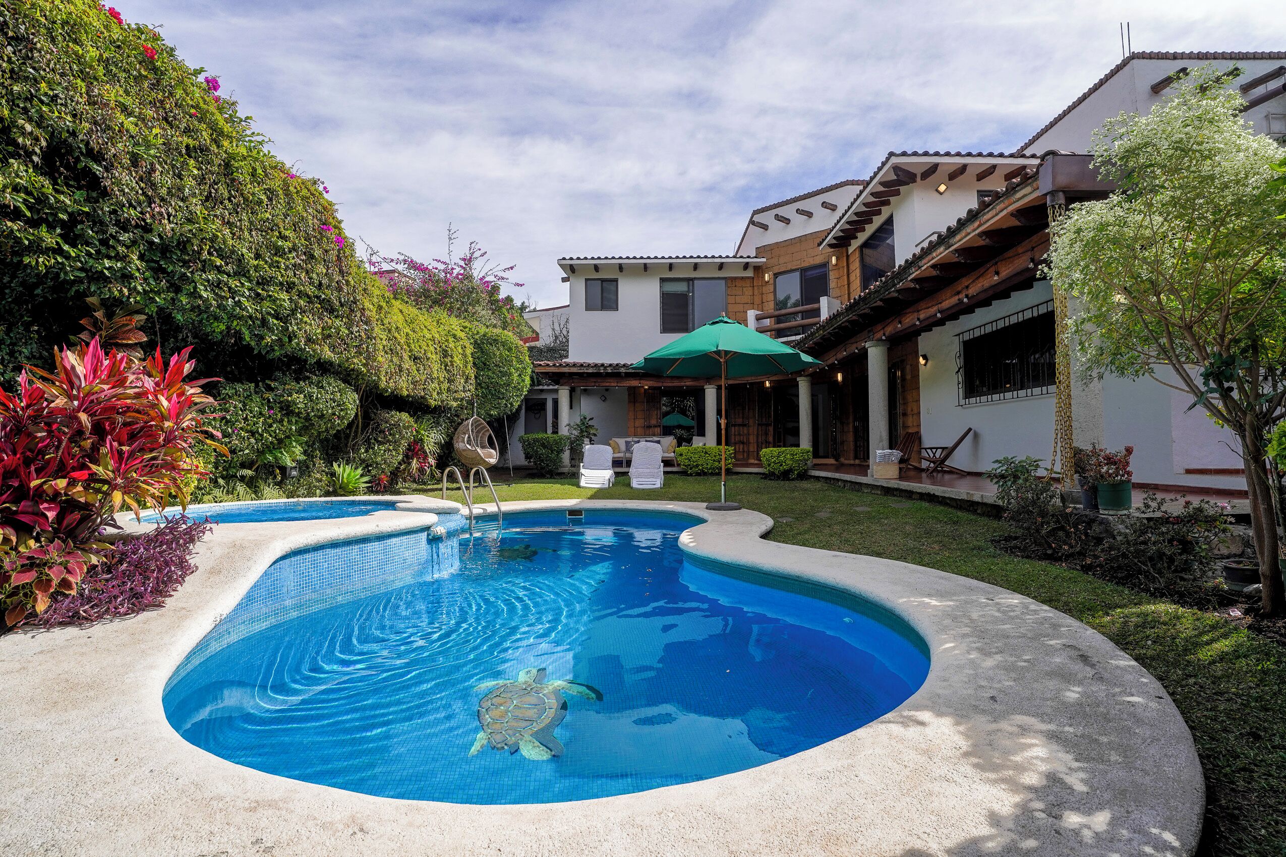 Outdoor pool, pool umbrellas, pool loungers
