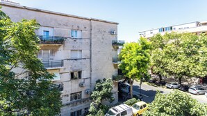 A multi-story building with balconies, parked cars, and trees. - Traditional Dalmatian Apt, 3 min Walk to Beach (Split)