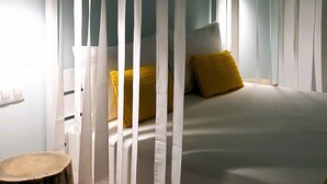 A bedroom with a bed, white curtains, and two pendant lights. - Mear Luxury Suite - The Ultimate Summer Nest (Kantanos-Selino)