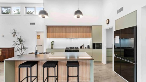 Beautiful new home within metres of beaches