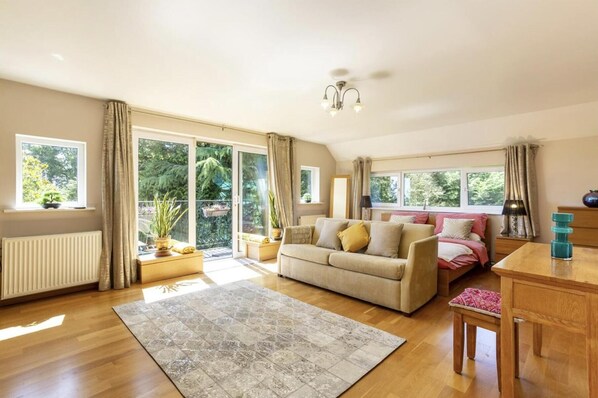 Villa | Living area | TV, fireplace