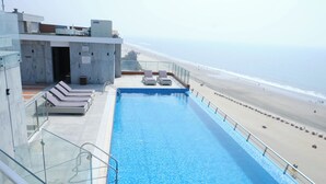 A rooftop pool with clear views of the beach and ocean. - Ramada by Wyndham Cox's Bazar Kolatoli Beach (Cox's Bazar)