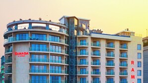 A multi-story hotel with a prominent "RAMADA" sign on the facade. - Ramada by Wyndham Cox's Bazar Kolatoli Beach (Cox's Bazar)