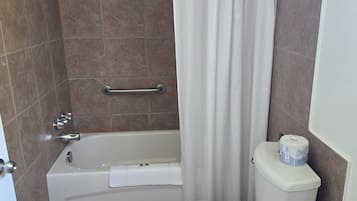 Combined shower/tub, hair dryer, towels, soap