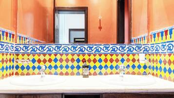 Jetted bath, rainfall showerhead, free toiletries, bathrobes