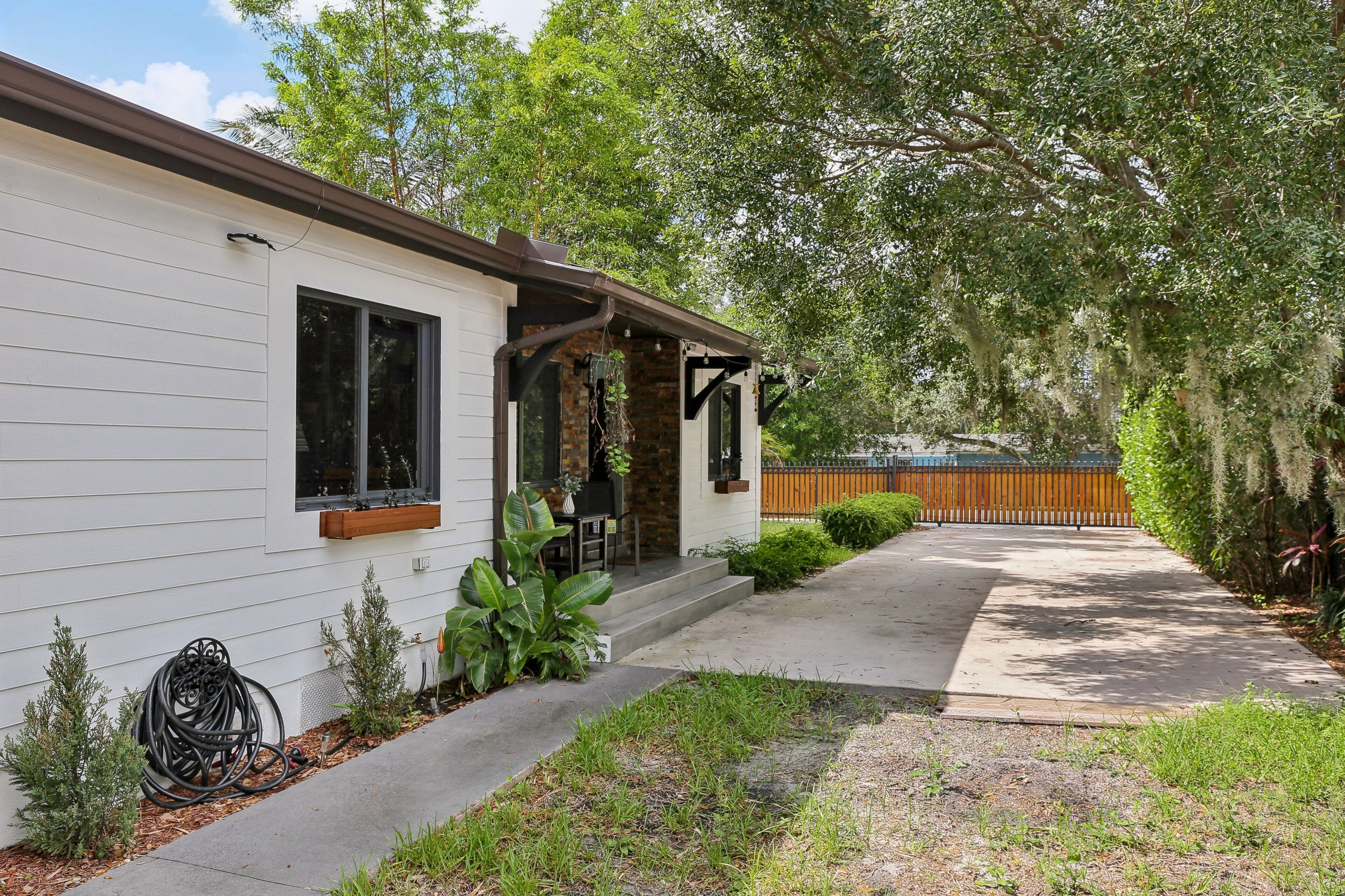Quintessential FL home with outdoor kitchen, canal views & central AC