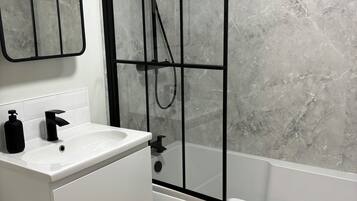 Hair dryer, towels, soap, shampoo