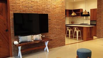 Luxury Apartment, Balcony | Living area | LCD TV, Netflix, pay films, streaming services