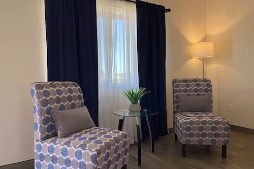 Habitación cuádruple Deluxe | Minibar, cortinas blackout, tabla de planchar con plancha y wifi gratis