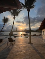 Outdoor pool, open 9:00 AM to 9:00 PM, pool umbrellas, sun loungers