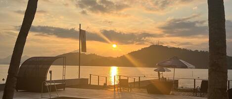 Outdoor pool, open 9:00 AM to 9:00 PM, pool umbrellas, sun loungers