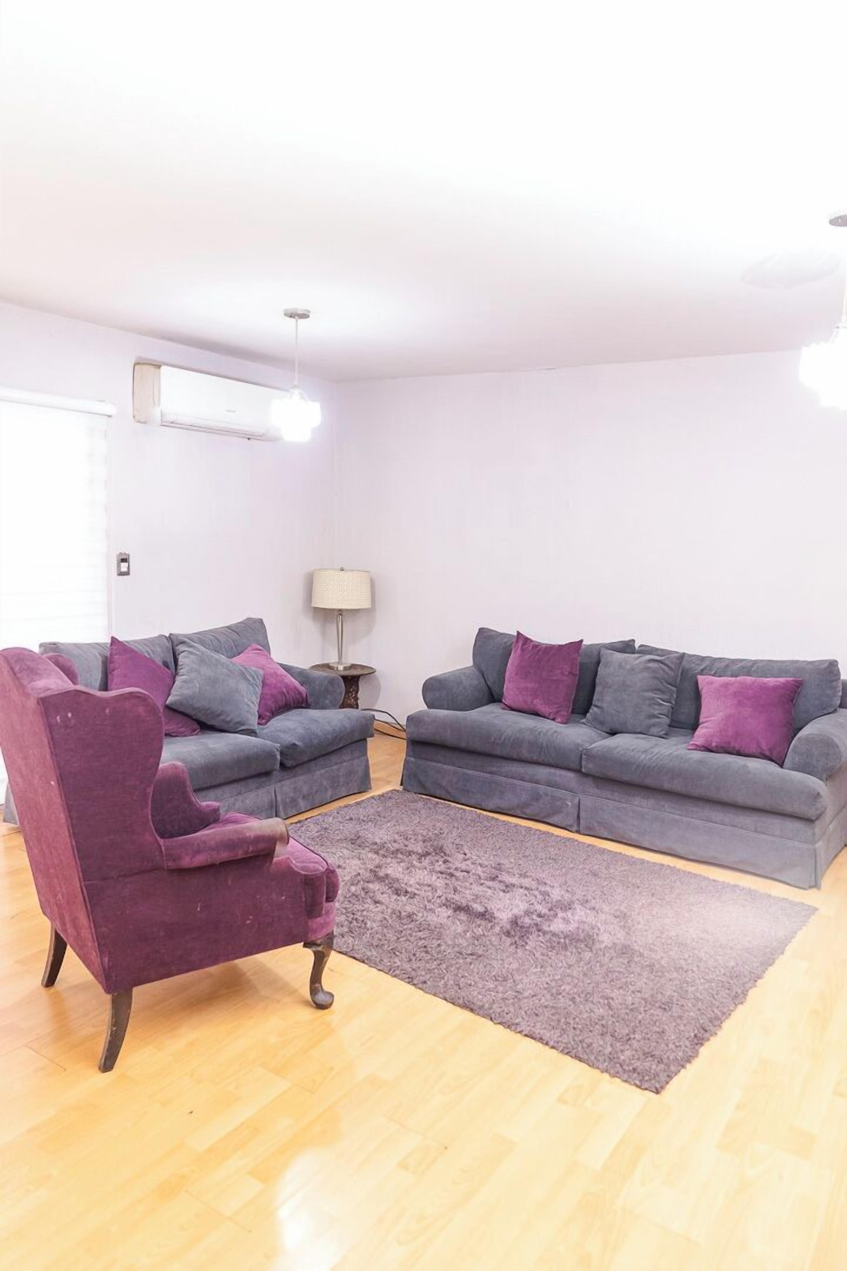 Executive Apartment, 3 Bedrooms | Living area | 40-inch plasma TV with cable channels